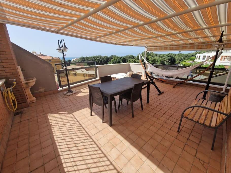 Terrazza A Nettuno E Chiesa Giubilare Santa Maria Goretti Dış mekan fotoğraf